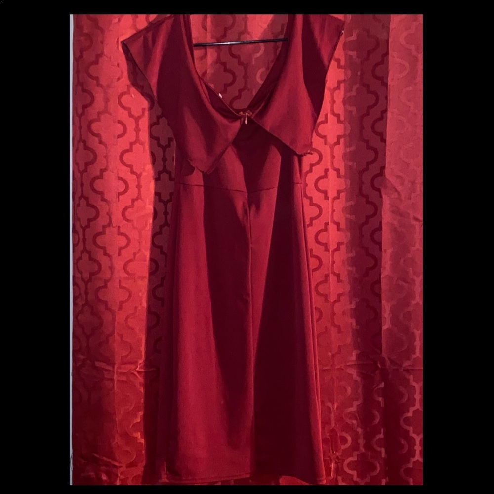 Burgundy dress with small split on the side
